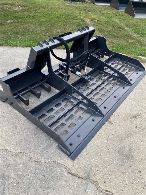 ground leveling attachment for skid steer|best implement for leveling ground.